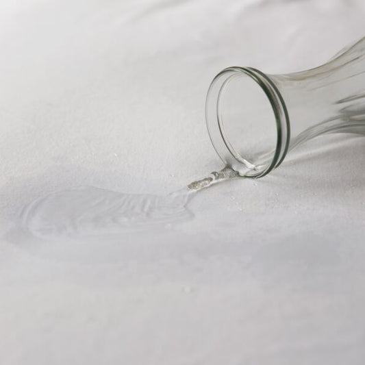 Clear glass vase on a white surface