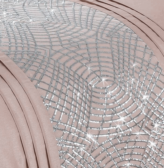 These glitzy Charleston duvet covers have been beautifully made from a blush pink satin fabric featuring a geometric glitter sparkle band across the duvet and down each pillowcase, the perfect addition to any boudoir bedroom. To complete the look, Charleston has a co-ordinating boudoir filled cushion and fully lined curtains. Product Details 100% Polyester Satin Face Fully machine washable Single sets include one pillowcase Other sized sets include two pillowcases