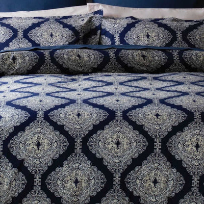 Ava by Belledorm double duvet set A striking geometric design that is bold, dramatic and confident. Deep navy and ivory tones work perfectly together to create an on trend feel. Made from cool 200 thread count 100% pure cotton the duvet set includes oxford style pillowcases to add an extra finishing touch.