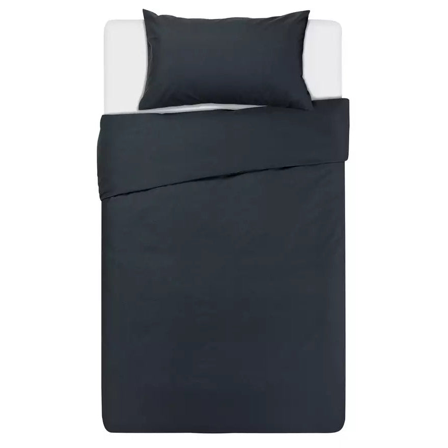 Black bedding set with a pillow on a white background