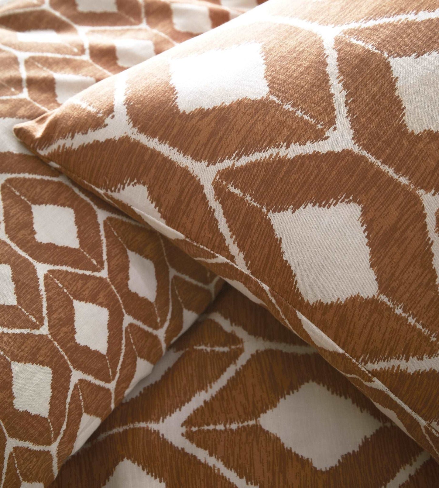 a warm and homely ethnic geometric print, inspired by tribal and native shapes and patterns