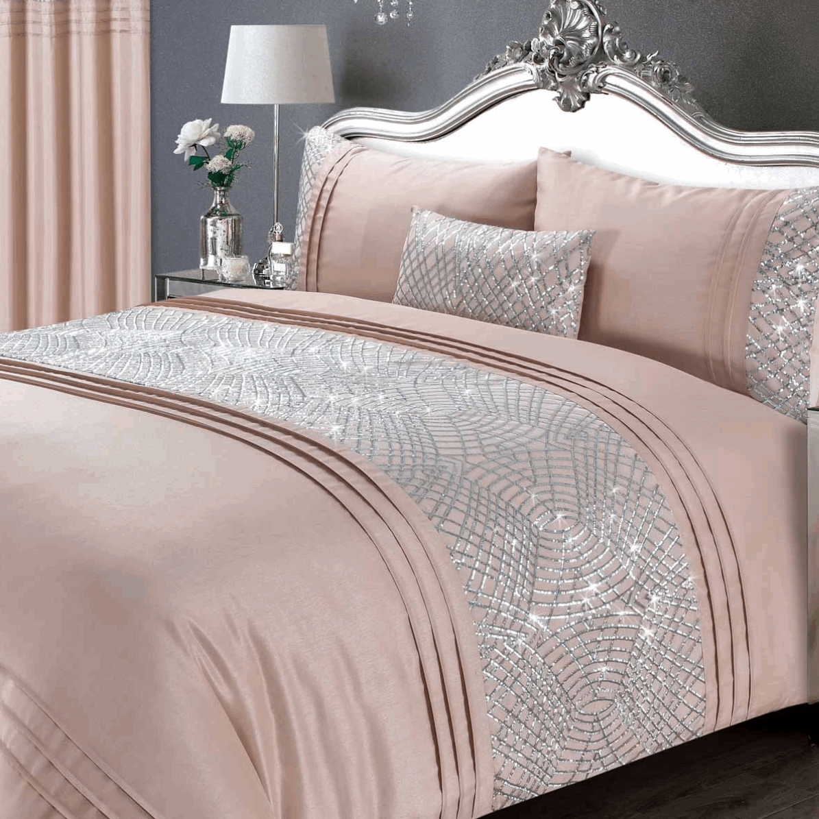 These glitzy Charleston duvet covers have been beautifully made from a blush pink satin fabric featuring a geometric glitter sparkle band across the duvet and down each pillowcase, the perfect addition to any boudoir bedroom. To complete the look, Charleston has a co-ordinating boudoir filled cushion and fully lined curtains.  Product Details  100% Polyester Satin Face Fully machine washable Single sets include one pillowcase Other sized sets include two pillowcases