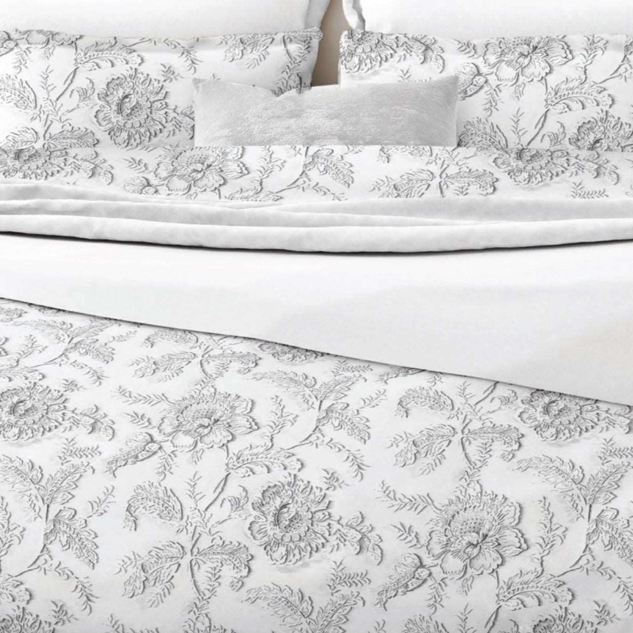 Light grey floral on a white background. Belledorm Ella Range 100% otton duvet set