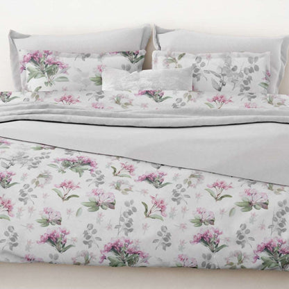 Elsbeth by Belledorm Printed on a crisp white background with flower heads in the prettiest of pink, leaves in the softest of green and touches of grey, Elsbeth is a truly fresh and modern floral. Made from cool 200 thread count 100% pure cotton the duvet set includes oxford style pillowcases to add an extra finishing touch