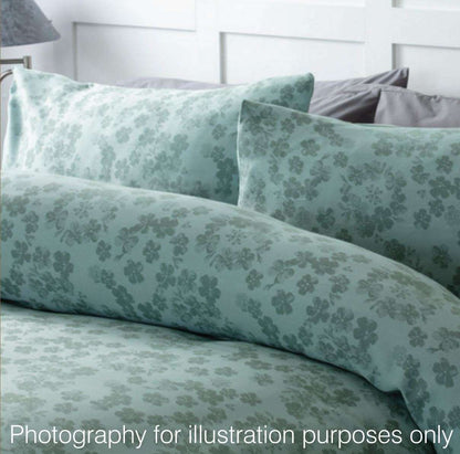 Flora is a modern floral jacquard in a warm shade of duck egg green. The beauty of the design is in the simplicity of the pretty scattered petals.