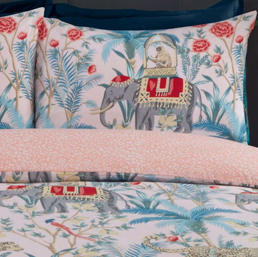 Stunning Jungle Expedition duvet cover featuring a vibrant and exotic print of leopards, elephants, monkeys and sways of palm leaves and flowers will work as an on-trend finishing touch to any bedroom. This navy blue design is also fully reversible with a delicate animal print reverse.