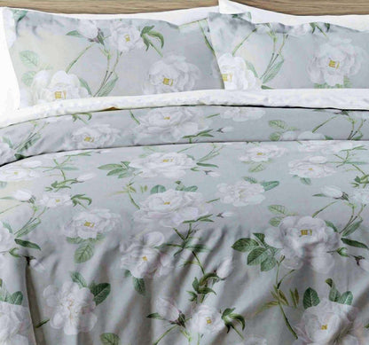 Large scale white peonies ,delicate greenery and a soft grey background gives Mishka a truly pretty and contemporary feel.