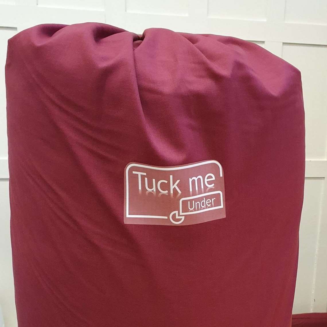 Drawstring bag with Tuck Me Under Logo