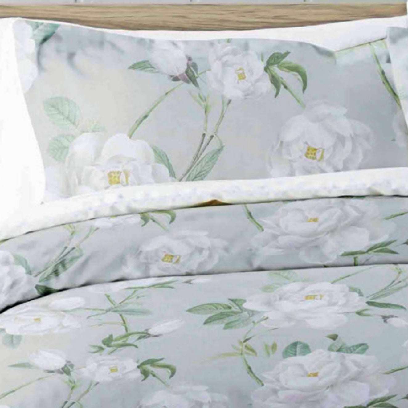 Large scale white peonies ,delicate greenery and a soft grey background Mishka by Belledorm pillowcases