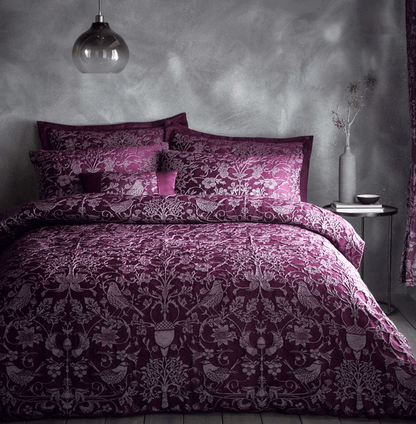 high quality woven relief jacquard in a deep plum colour palette this bedding set 
