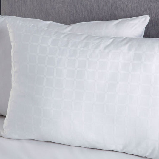 5* Hotel Suite filled Pillows which come in a PAIR now have a finer denier filling of silky soft micron clusters providing softness and comfort, yet still maintaining their shape and loft. Its the perfect choice for those who prefer a medium to slightly firmer pillow to rest on. Our Luxury 5* Hotel Suite Pillow PAIR measure 48 x 74cm. They are full washable and hypo allergenic.