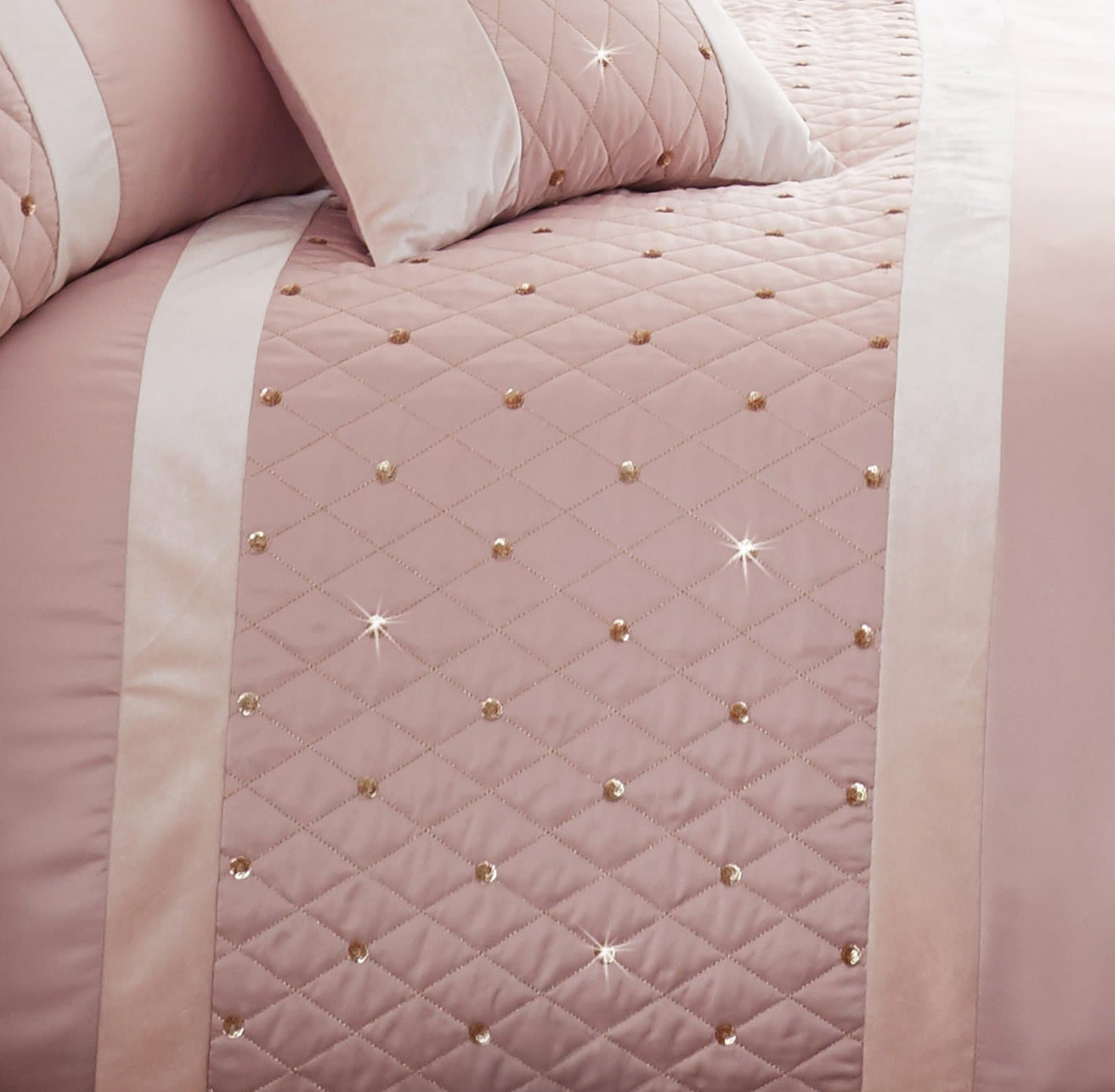 Quilted border with sequin embellishment creates an elegant look